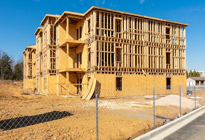 a snapshot of temporary chain link fences protecting a large construction project from unauthorized access in Saugus, MA